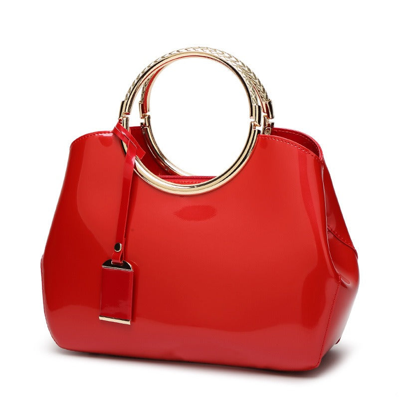 Shiny patent leather crossbody handbag