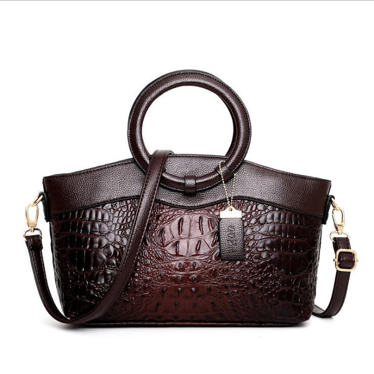 Stylish ring handle handbag
