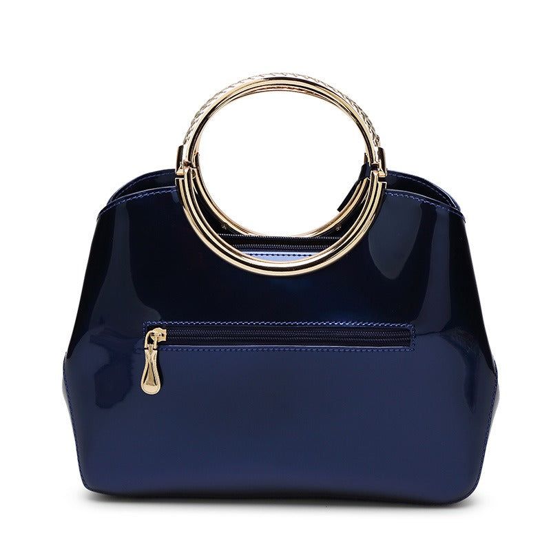 Shiny patent leather crossbody handbag