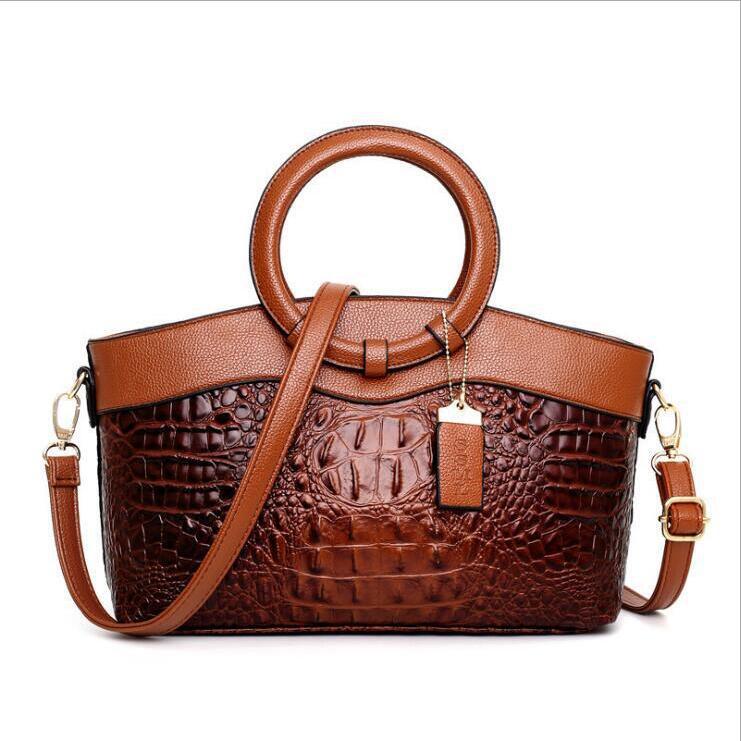 Stylish ring handle handbag