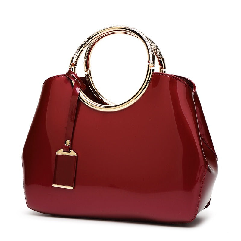 Shiny patent leather crossbody handbag