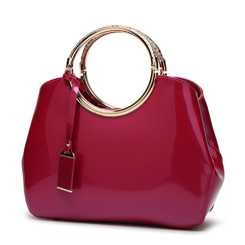 Shiny patent leather crossbody handbag